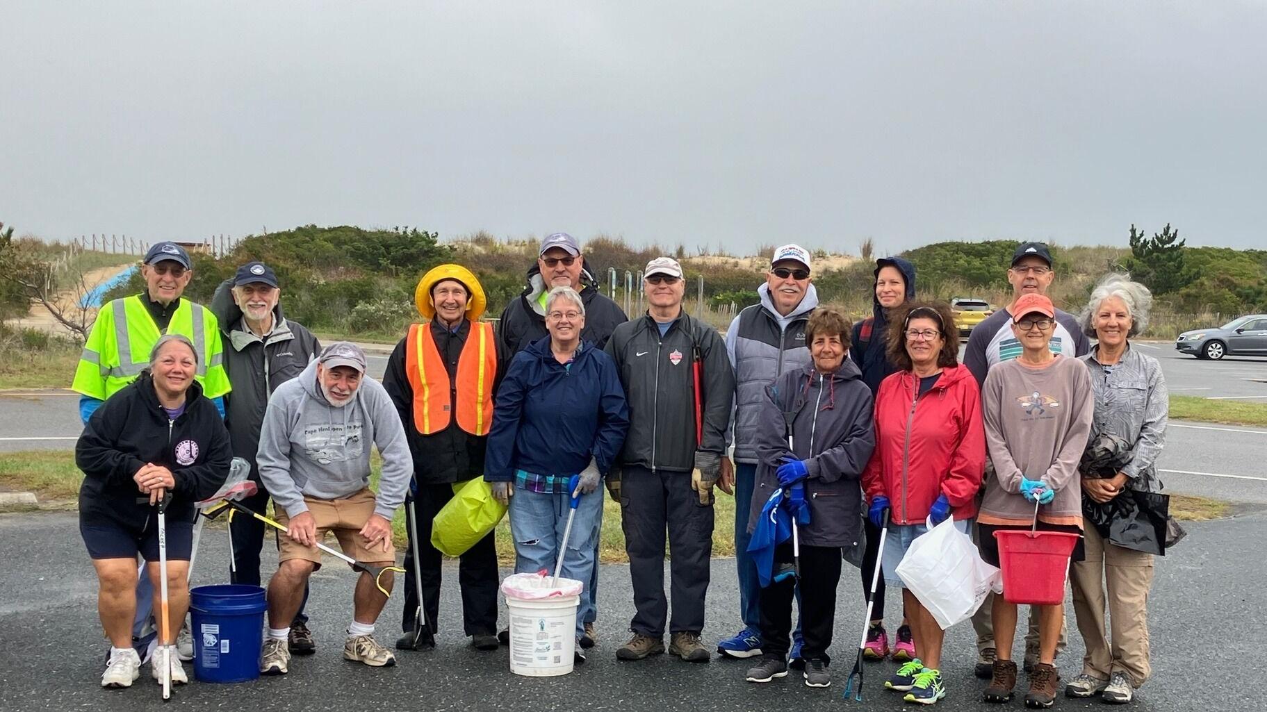Volunteers clean trails at Cape Henlopen State Park despite rainy weather
